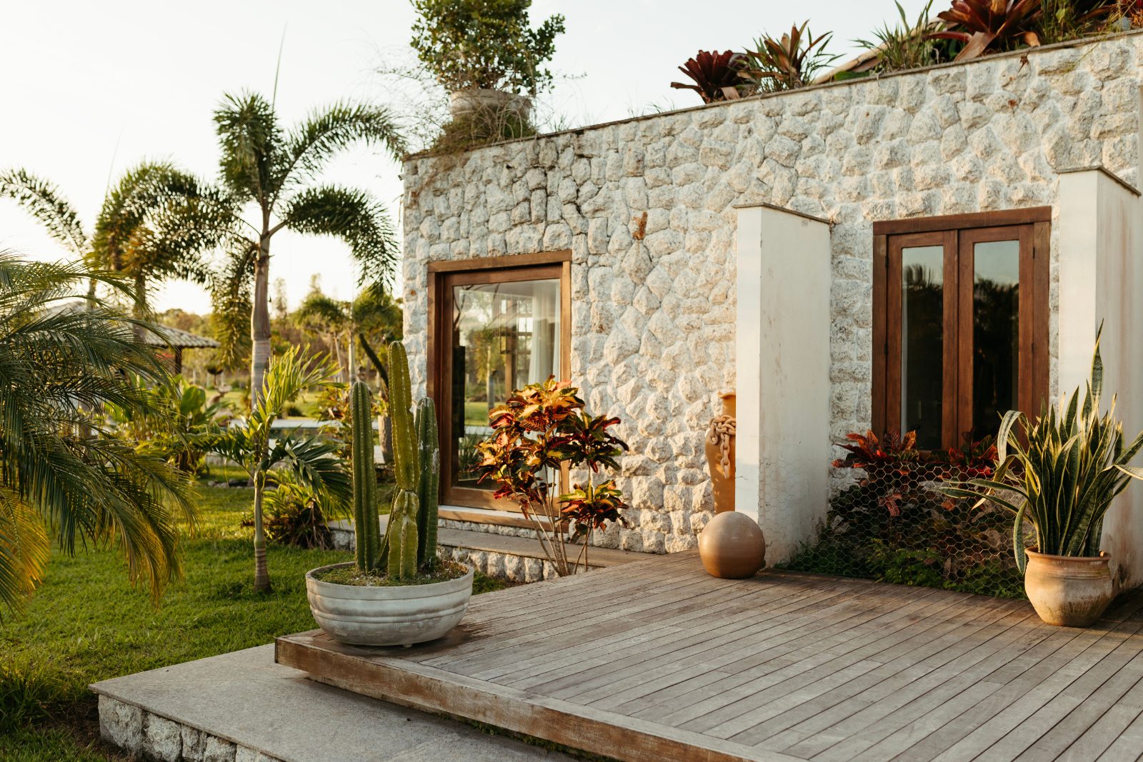 Open-plan villa interior looking onto the garden